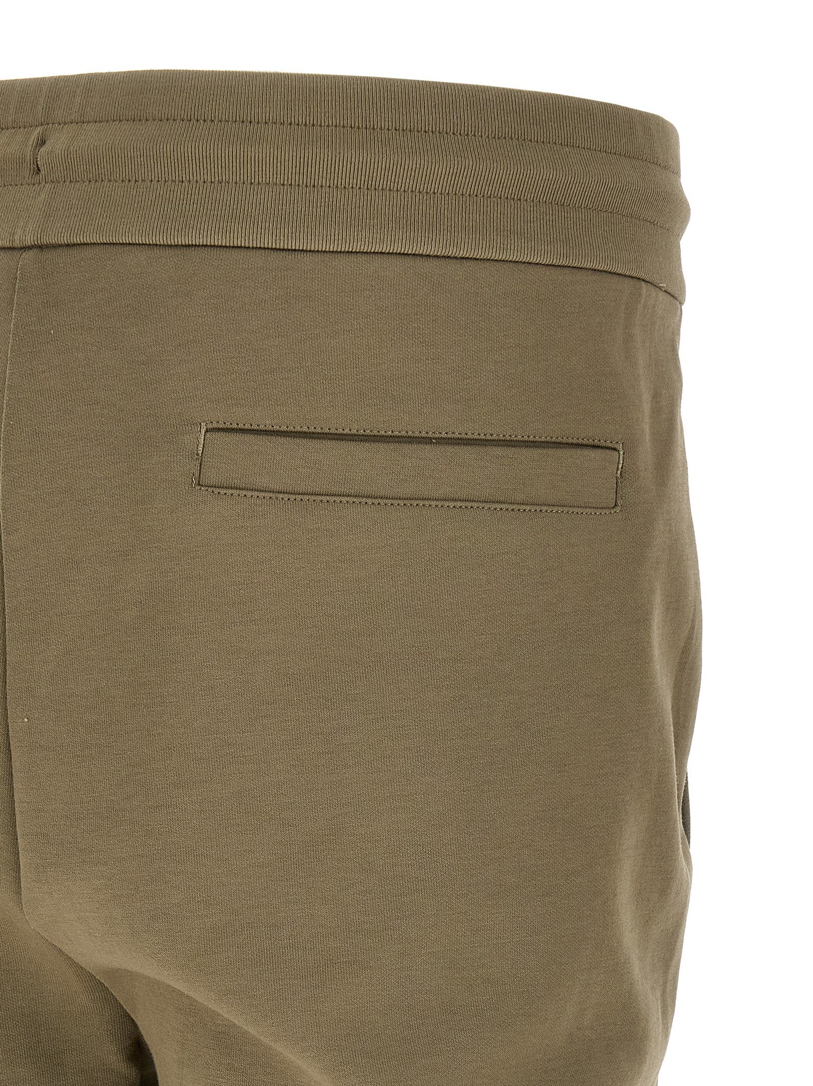 Joggers by Hugo Boss for men in polyester cotton & leather bicolour & green features an sartorial straight-leg and long with a cut for a sartorial finish.
