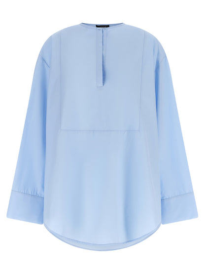 Blouse by Fabiana Filippi for women in cotton light-blue presents a discerning silhouette, showcasing a sophisticated v-neck neckline and for a truly discerning finish.