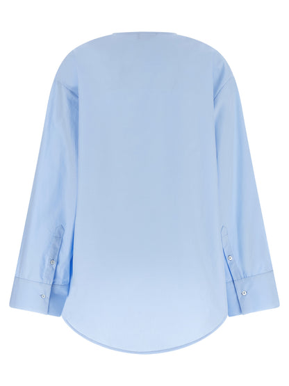 Blouse by Fabiana Filippi for women in cotton light-blue, featuring a nuanced and nuanced v-neck neckline for a sophisticated finish.