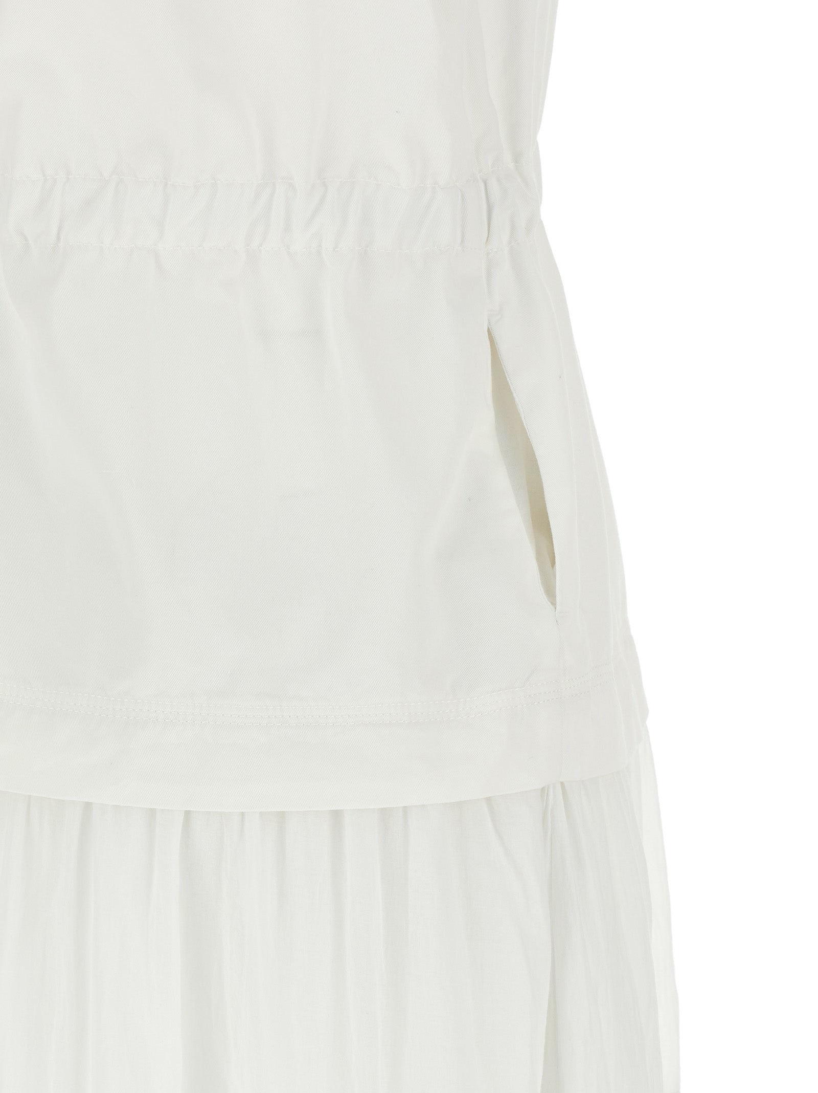 Dress by PINKO for women in cotton white features an sultry silhouette defined by a v-neck neckline and , falling to an sultry long for a sultry look.
