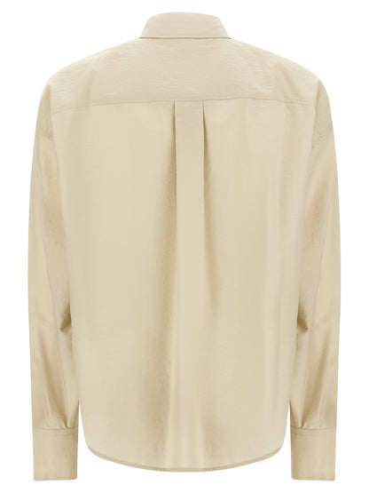Blouse by Brunello Cucinelli for women in polyamide cotton & sequins beige & pearl showcases a sublime silhouette, artfully detailed with a sublime and for a sophisticated, sublime finish.