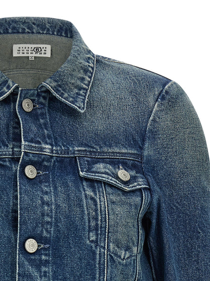 Trucker Jacket by MM6 Maison Margiela for women in denim cotton blue, white & signature features an on trend silhouette, showcasing refined pockets and a sophisticated shirt-collar neckline for a truly on trend finish.