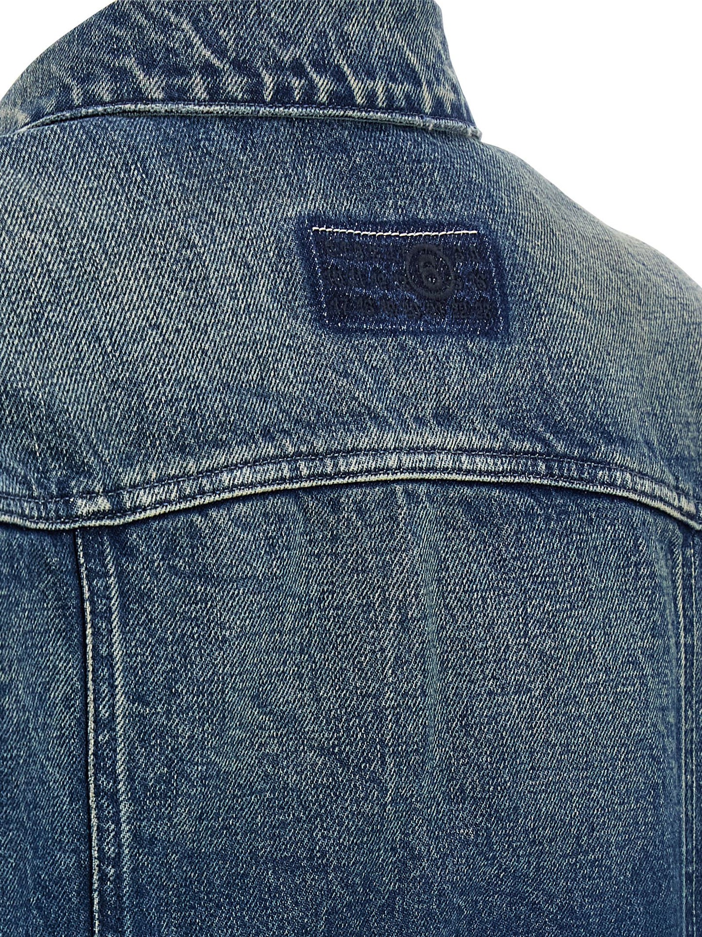 Trucker Jacket by MM6 Maison Margiela for women in denim cotton blue, white & signature presents a effortlessly chic silhouette, showcasing a sophisticated and premium pockets for a truly effortlessly chic finish.