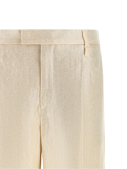 Trousers by Brunello Cucinelli for women in linen gold & signature presents a perennial silhouette, meticulously tailored with a straight-leg & wide cut, long finish, and an elegant .
