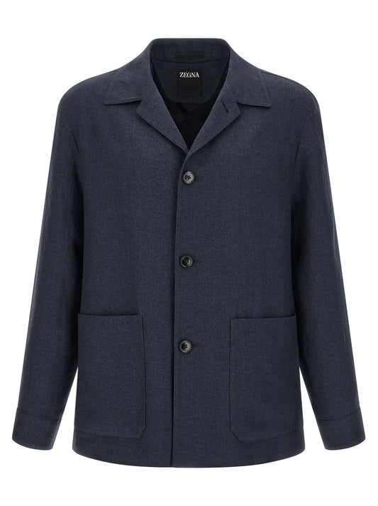 Overcoat by ZEGNA for men in linen wool & leather blue & signature features an voluminous silhouette, showcasing distinct pockets and a voluminous shirt-collar neckline for a truly voluminous aesthetic.