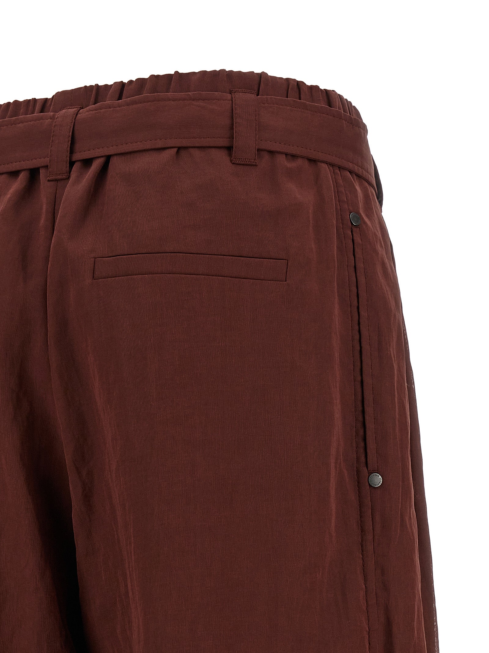 Trousers by Brunello Cucinelli for women in cotton & silk bordeaux & transparent features a tailored silhouette with a tailored flared & wide, defined by its long and a sophisticated high rise.