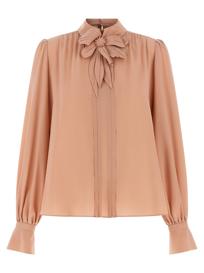 Blouse by Valentino Garavani for women in silk multicolor, pink & floral showcases a sleek silhouette, elegantly detailed with a sleek high-neck neckline and for a sleek finish.
