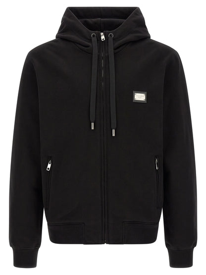 Sweatshirt Hoodie by Dolce & Gabbana for men in cotton black features an luminous silhouette, showcasing a sophisticated hooded neckline and long-sleeve for a truly luminous look.