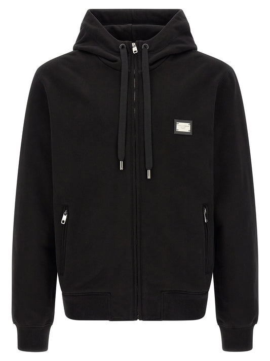 Sweatshirt Hoodie by Dolce & Gabbana for men in cotton black features an luminous silhouette, showcasing a sophisticated hooded neckline and long-sleeve for a truly luminous look.