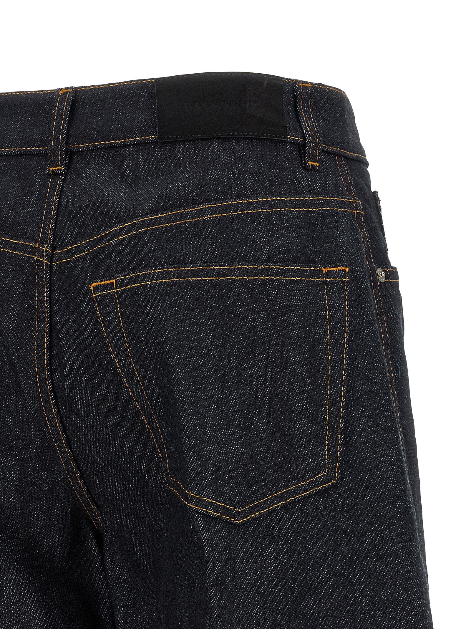 Jeans by Givenchy for women in denim cotton & suede leather blue features an refined tailoring silhouette, showcasing a premium flared & wide with a and long cut for a refined tailoring look.