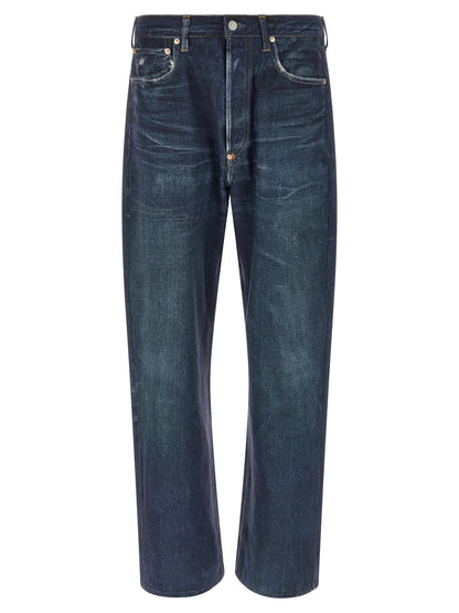 Jeans by Junya Watanabe for men in linen & denim cotton blue presents a tailored silhouette, showcasing a tailored straight-leg & wide and long cut with a refined high rise for a truly tailored aesthetic.