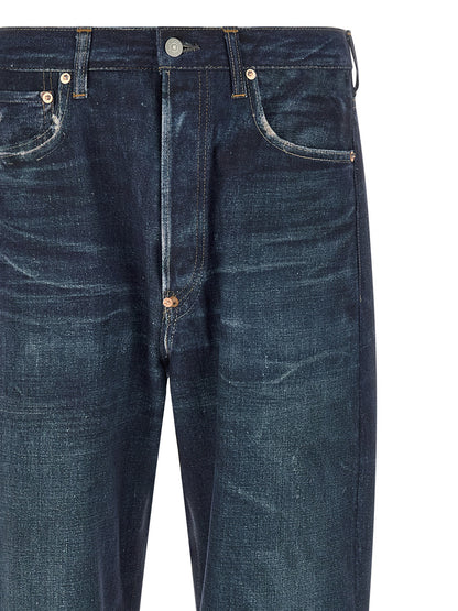 Jeans by Junya Watanabe for men in linen & denim cotton blue features a refined silhouette with a refined straight-leg & wide, defined by a high rise and a refined long for a refined finish.