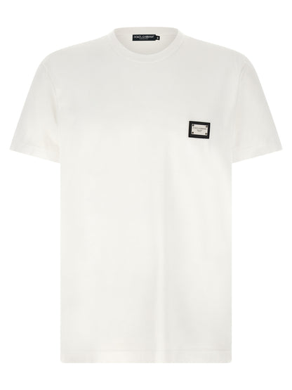 T-Shirt by Dolce & Gabbana for men in leather & cotton white showcases a fashionable silhouette, elegantly detailed with a fashionable short-sleeve and crew neckline for a sophisticated, high-fashion look.