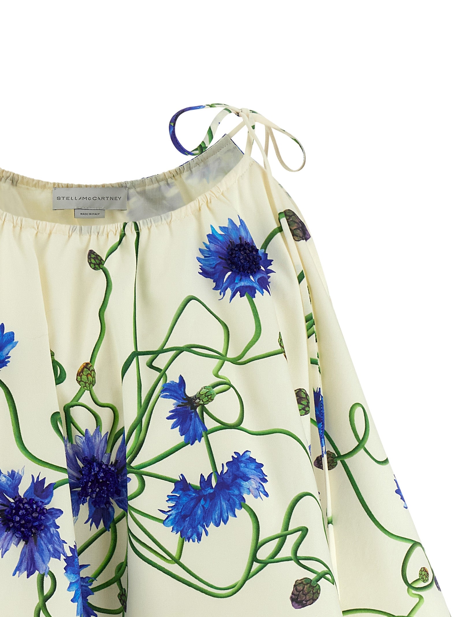 Blouse by Stella McCartney for women in organic cotton blue & print showcases a sleek silhouette, elegantly detailed with a sleek round neckline and for a sleek finish.