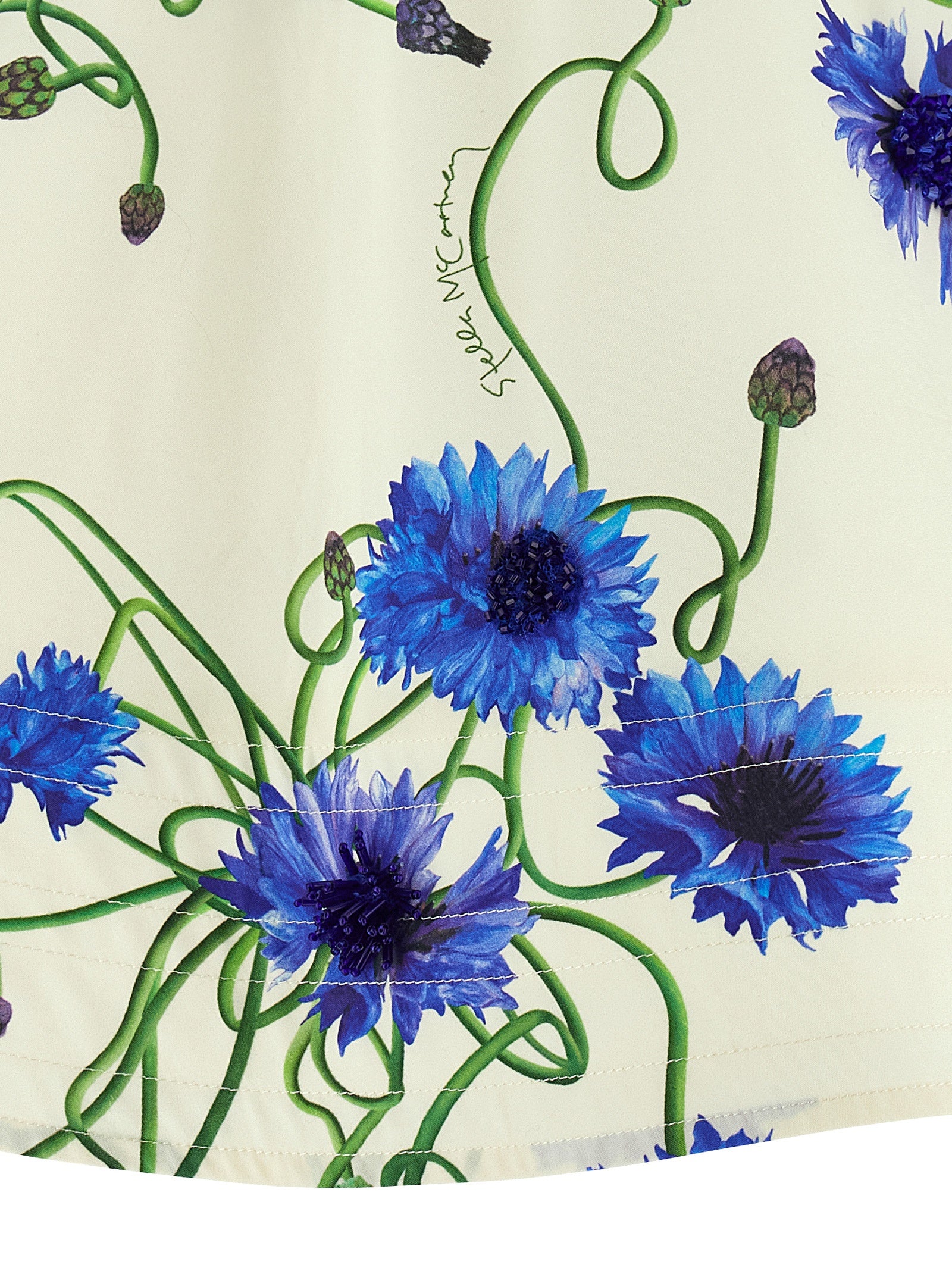 Blouse by Stella McCartney for women in organic cotton blue & print presents a discerning silhouette, showcasing a sophisticated and for a truly discerning finish.