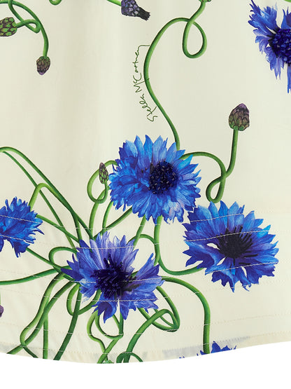 Blouse by Stella McCartney for women in organic cotton blue & print presents a discerning silhouette, showcasing a sophisticated and for a truly discerning finish.