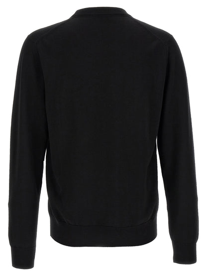 Cardigan by Dolce & Gabbana for men in virgin wool black features a dramatic silhouette, showcasing a sophisticated crew neckline and dramatic detail for a timeless, premium look.