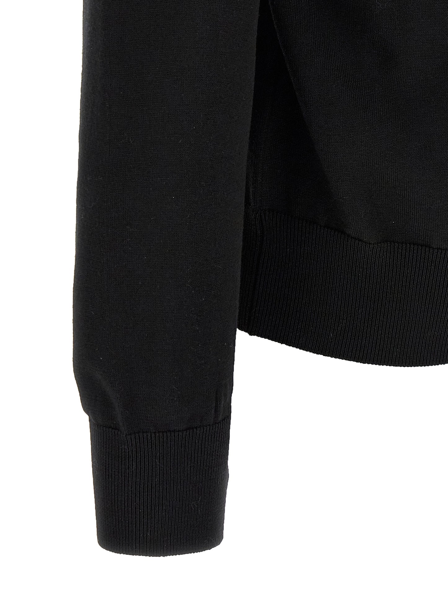 Cardigan by Dolce & Gabbana for men in virgin wool black features an impeccable silhouette, showcasing a sophisticated and detail for a truly impeccable finish.