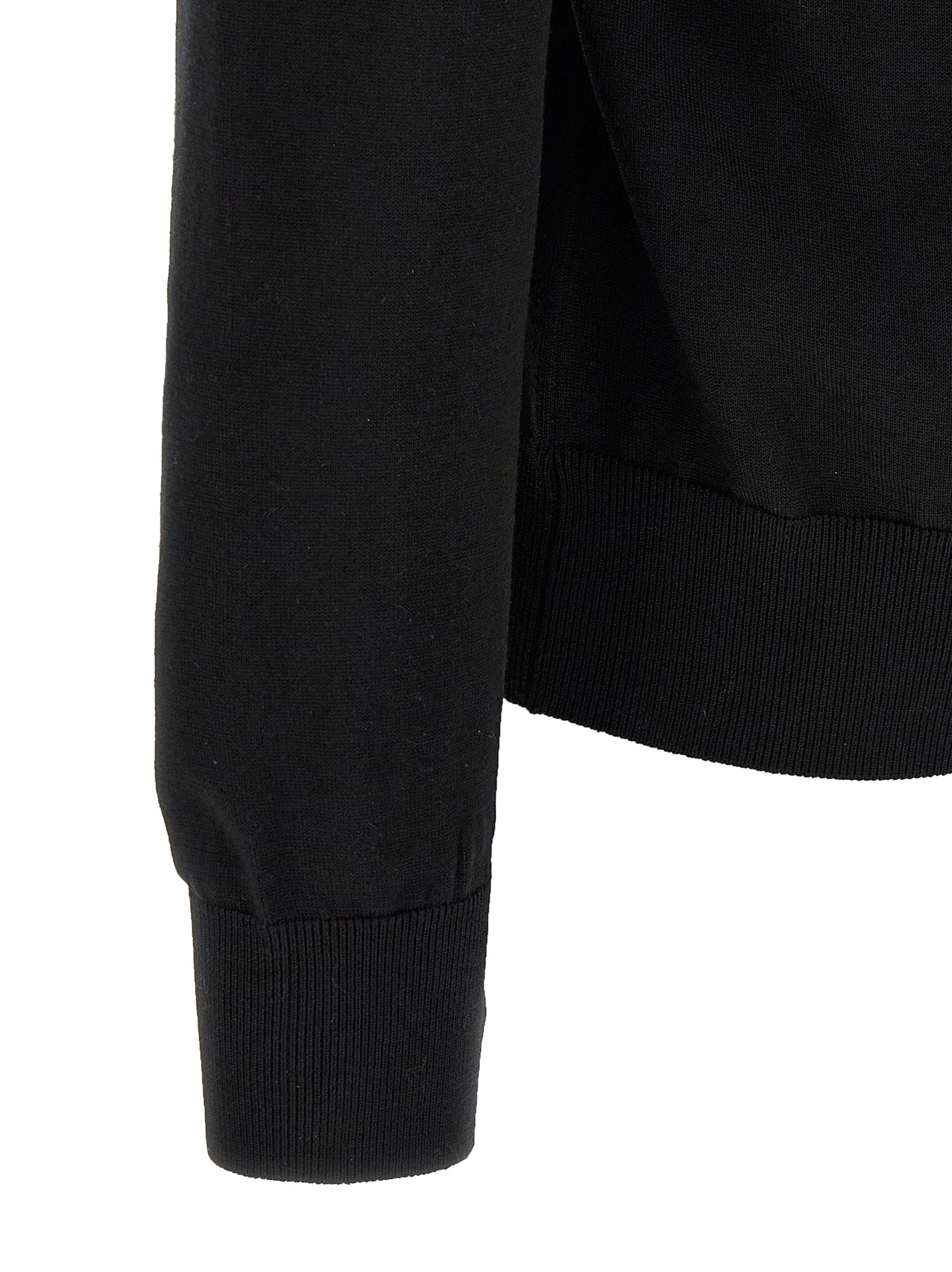 Cardigan by Dolce & Gabbana for men in virgin wool black features an impeccable silhouette, showcasing a sophisticated and detail for a truly impeccable finish.