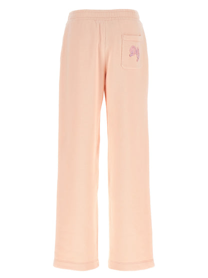 Joggers by Dolce & Gabbana for women in cotton multicolor & pink presents a refined pantology silhouette, artfully defined by a refined pantology athletic & wide, long, and a sophisticated .