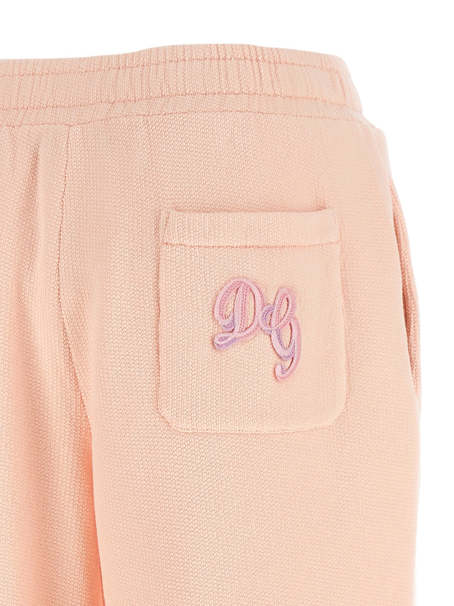 Joggers by Dolce & Gabbana for women in cotton multicolor & pink features an sartorial athletic & wide and long with a cut for a sartorial finish.