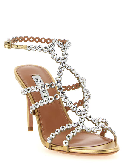 Stiletto Ankle Strap Sandals by Aquazzura for women in lamb leather gold & patterned showcases a sculptural silhouette as Women's Lamb Leather Stiletto Ankle Strap Sandals, defined by a sculptural stiletto and sculptural for a sculptural look.