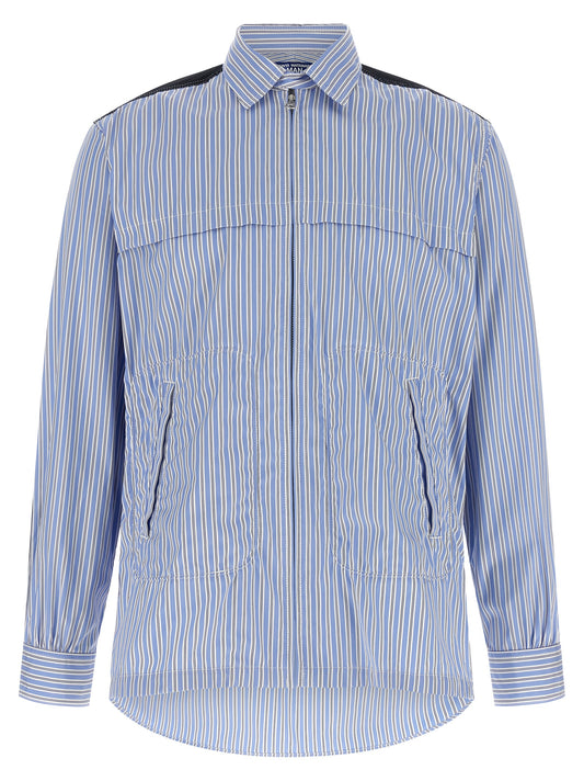 Shirt by Junya Watanabe for men in denim cotton light-blue & striped showcases a sublime silhouette, artfully detailed with a sublime and long-sleeve for a sophisticated, sublime finish.