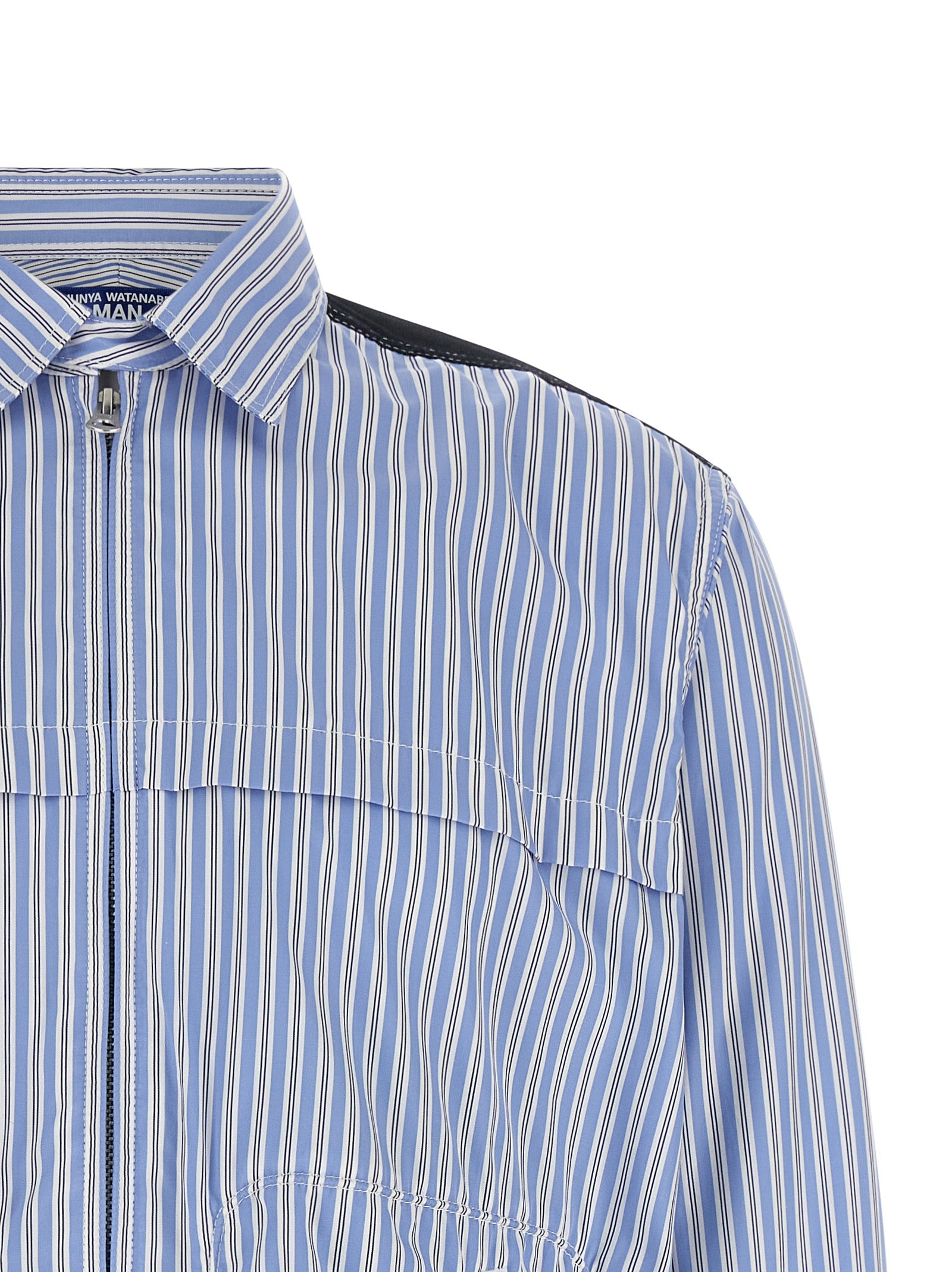 Shirt by Junya Watanabe for men in denim cotton light-blue & striped presents a discerning silhouette, showcasing a sophisticated and for a truly discerning finish.