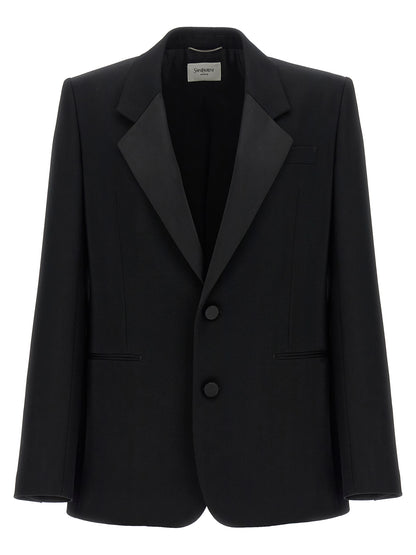 This Blazer by Saint Laurent for men in wool silk satin black presents a tailored silhouette, meticulously tailored with a tailored split neckline and distinctive for a tailored finish.