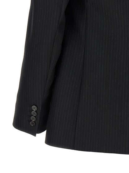 This Blazer by Saint Laurent for men in wool & silk black & pinstripe presents a tailored silhouette, meticulously tailored with a tailored and distinctive for a tailored finish.