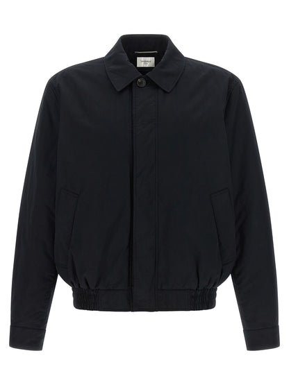 Windbreaker Jacket by Saint Laurent for men in cotton & silk black showcases a modern silhouette, integrating pockets & windproof and a modern for a sophisticated finish.