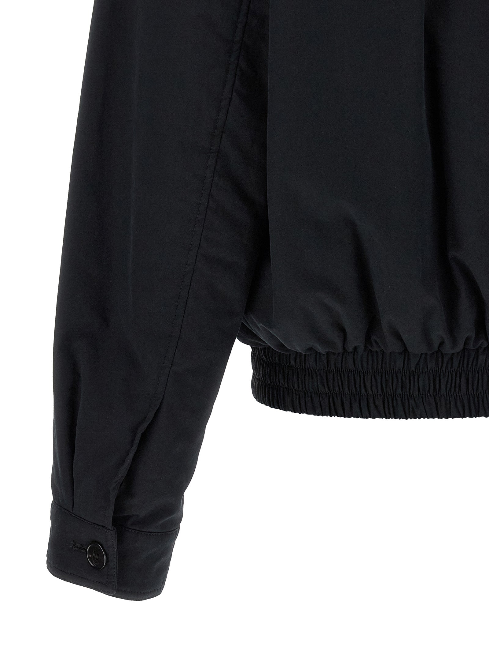 Windbreaker Jacket by Saint Laurent for men in cotton & silk black features an magnificent silhouette, showcasing the sophisticated and functional pockets & windproof for a premium, magnificent look.