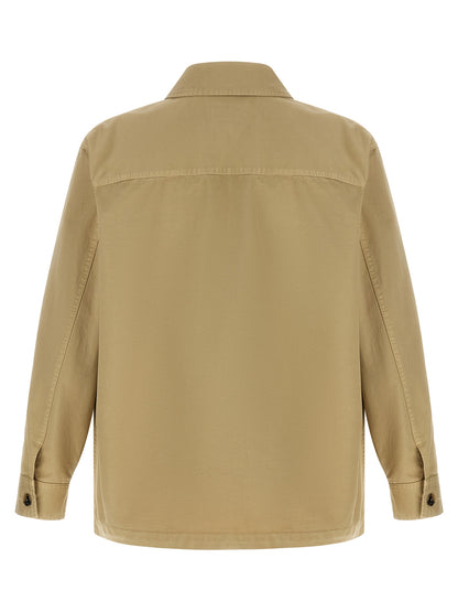 Overshirt by Saint Laurent for men in cotton beige & horn showcases a sleek silhouette, elegantly detailed with a sleek and for a sleek finish.