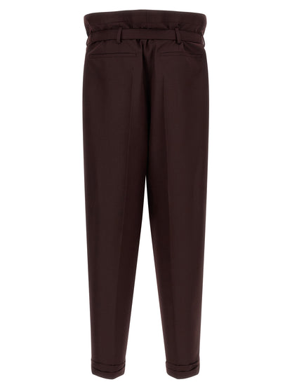 Trousers by Saint Laurent for men in mohair wool purple features a tailored silhouette with a tailored , defined by its long and a sophisticated .