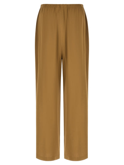 Trousers by Max Mara for women in linen & viscose beige features a tailored silhouette with a tailored straight-leg & wide, defined by its long and a sophisticated .