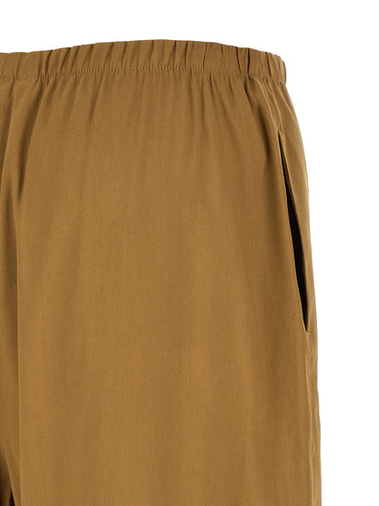 Trousers by Max Mara for women in linen & viscose beige features an sartorial silhouette, showcasing a precise straight-leg & wide and long with a sartorial for a refined look.