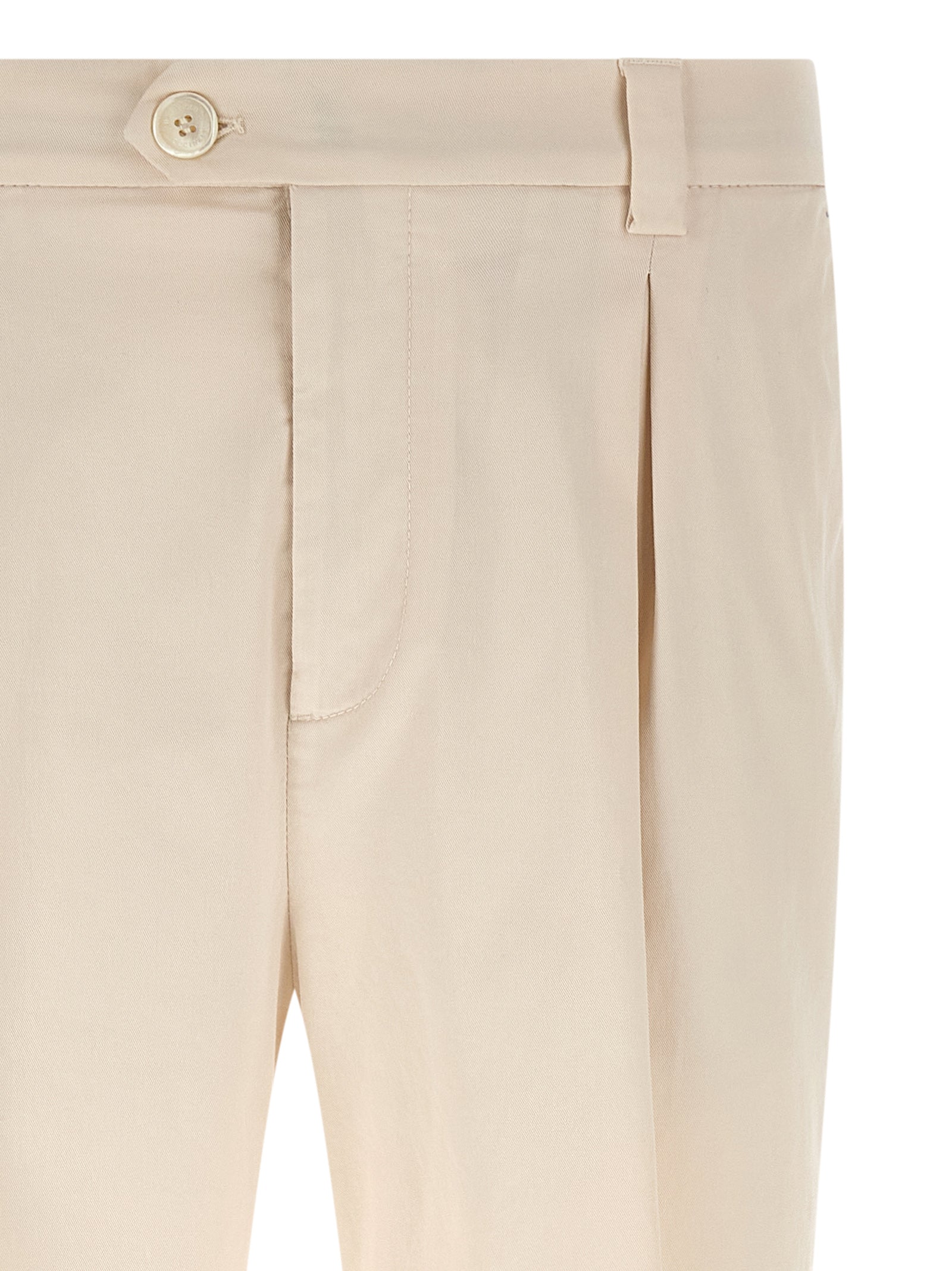 Trousers by Brunello Cucinelli for men in suede leather & cotton white presents a perennial silhouette, meticulously tailored with a regular-fit cut, long finish, and an elegant .