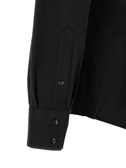 Shirt by Brunello Cucinelli for men in cotton black showcases a sleek silhouette, elegantly detailed with a sleek and for a sleek finish.