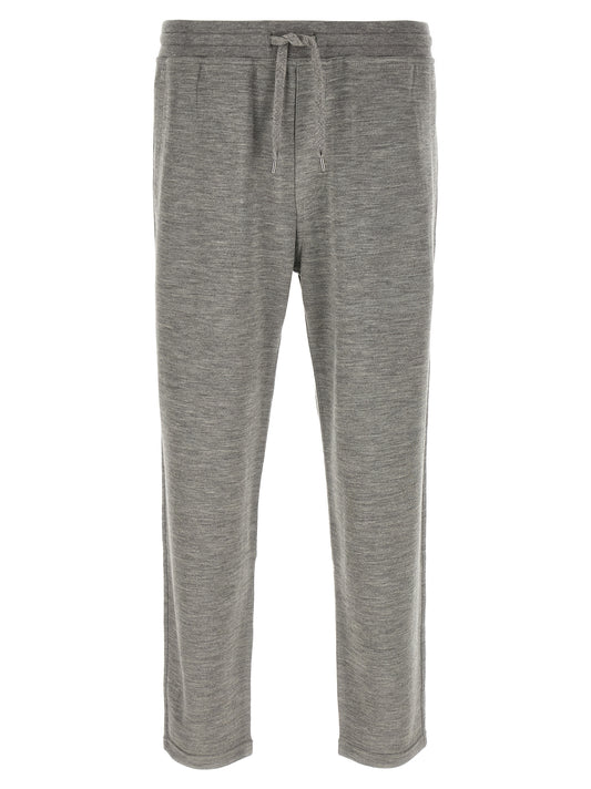 Joggers by Brunello Cucinelli for men in polyamide & cashmere gray presents a tailored silhouette, showcasing a tailored straight-leg and long cut with a refined for a truly tailored aesthetic.