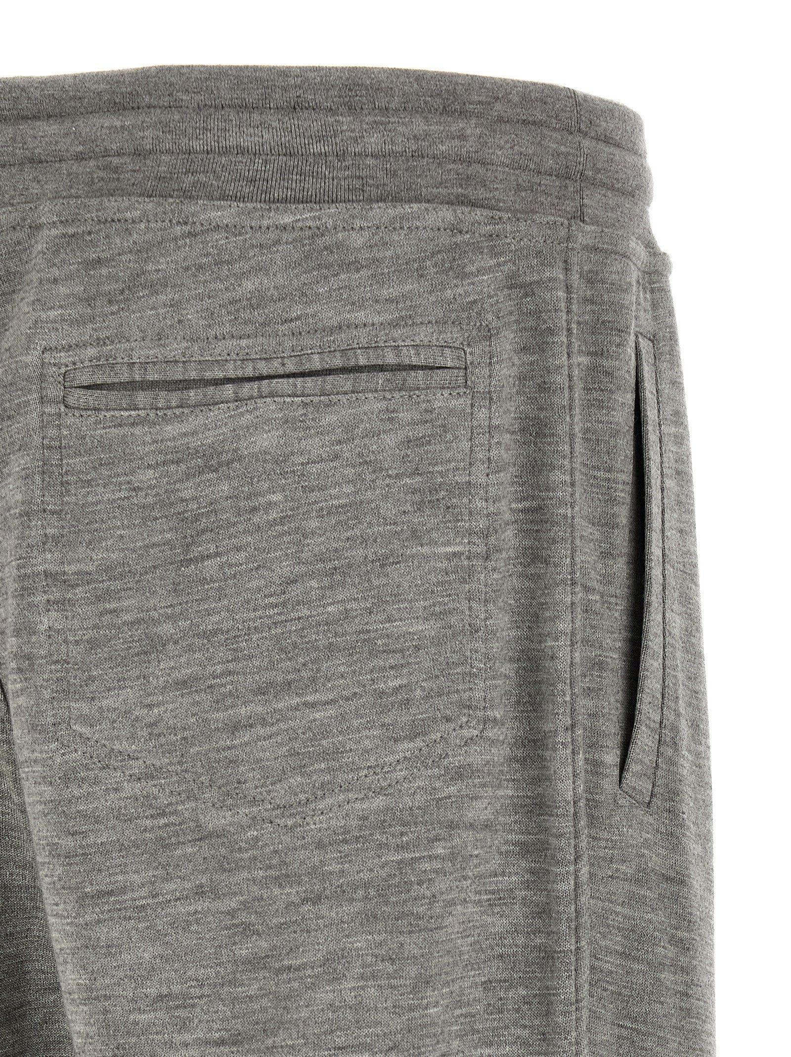 Joggers by Brunello Cucinelli for men in polyamide & cashmere gray features a polished silhouette with a polished straight-leg, reaching a polished long and finished with a polished .