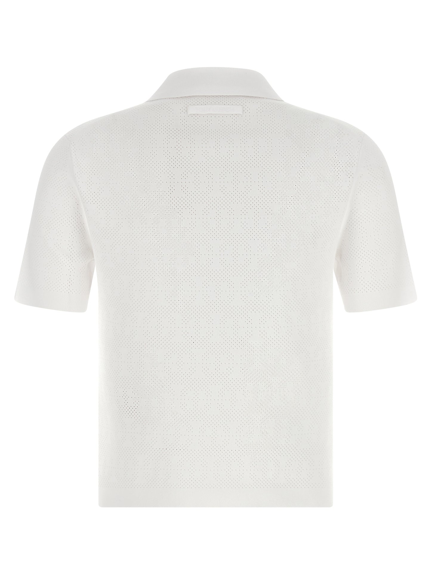 This Polo Shirt by Tory Burch for women in viscose polyester & polyamide white presents a flawless silhouette, showcasing flawless detailing and a refined for a truly flawless aesthetic.