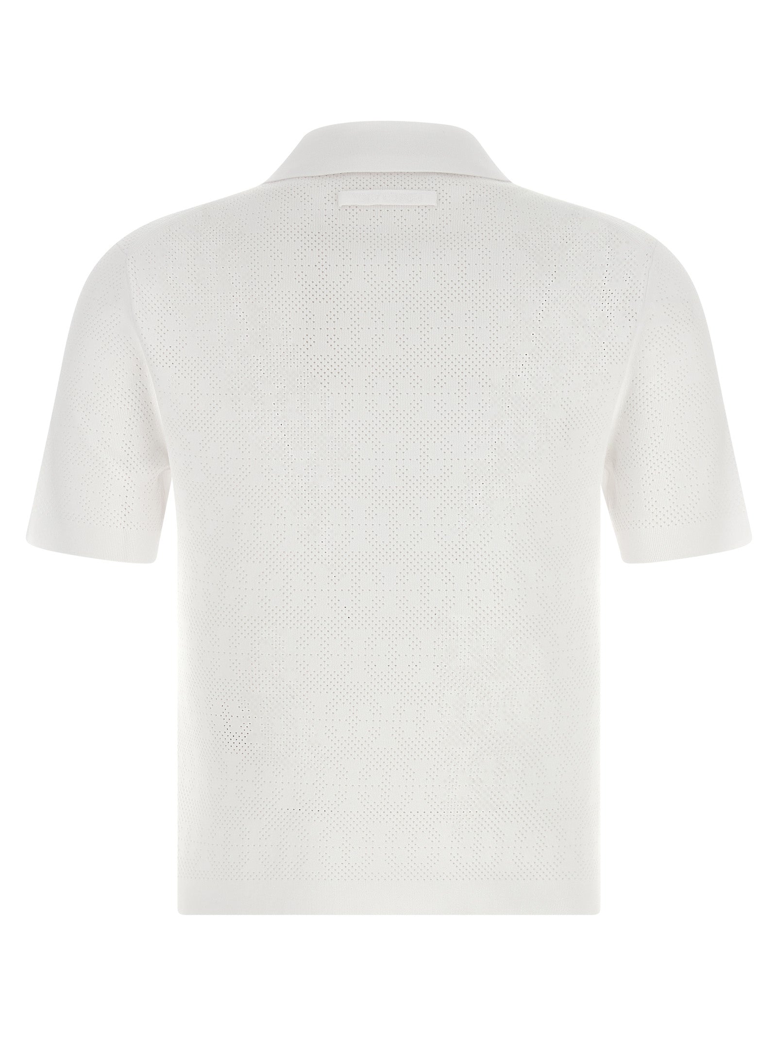 This Polo Shirt by Tory Burch for women in viscose polyester & polyamide white presents a flawless silhouette, showcasing flawless detailing and a refined for a truly flawless aesthetic.