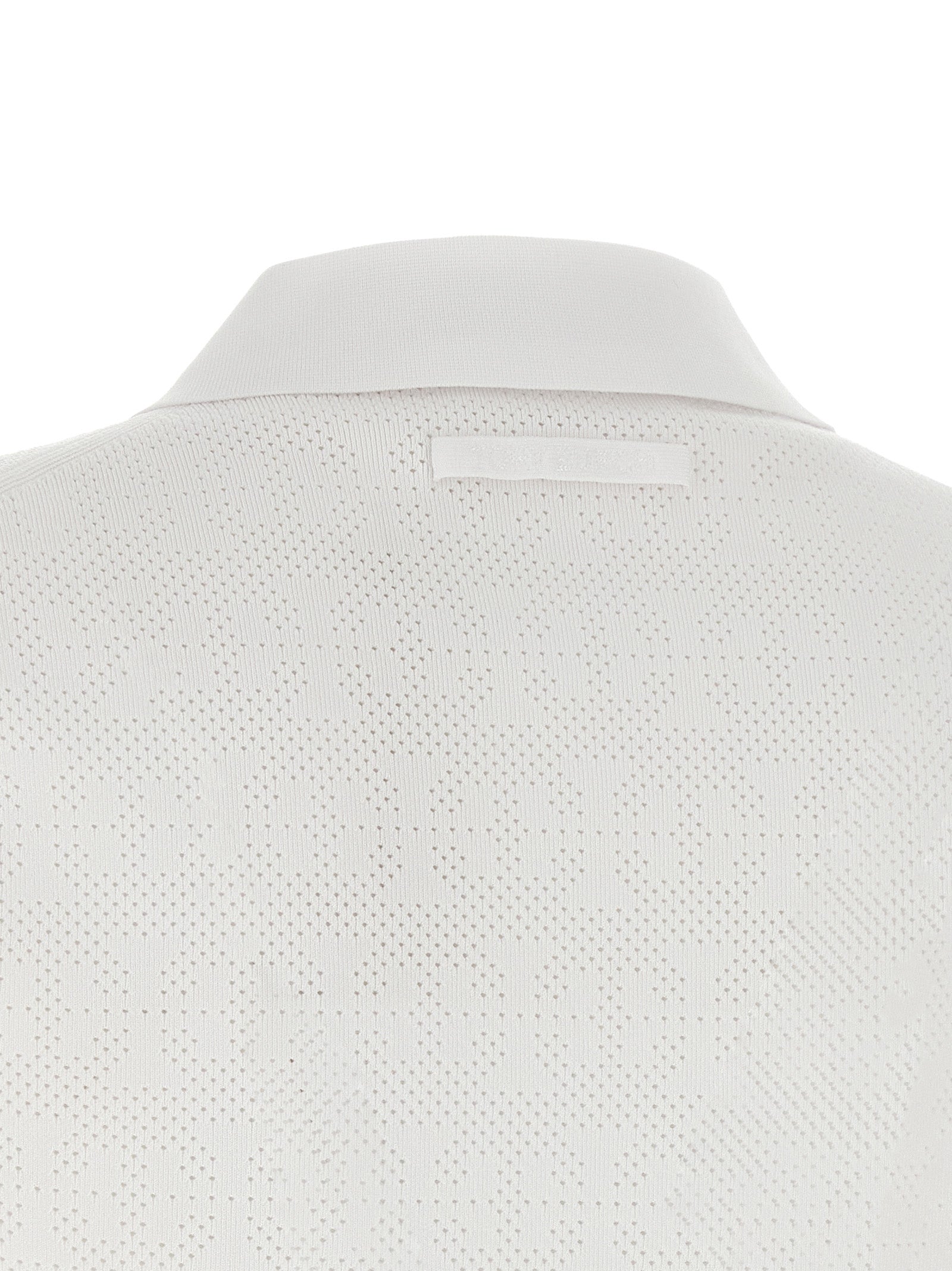 Polo Shirt by Tory Burch for women in viscose polyester & polyamide white presents a crisp silhouette, artfully detailed with a crisp and crisp .
