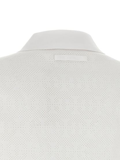Polo Shirt by Tory Burch for women in viscose polyester & polyamide white presents a crisp silhouette, artfully detailed with a crisp and crisp .