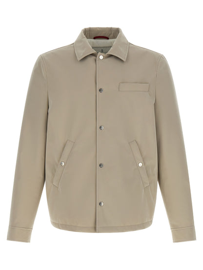 Overcoat by Brunello Cucinelli for men in polyester & nylon gray features a cosy chic silhouette, artfully detailed with a sophisticated and premium windproof & pockets for a cosy chic finish.