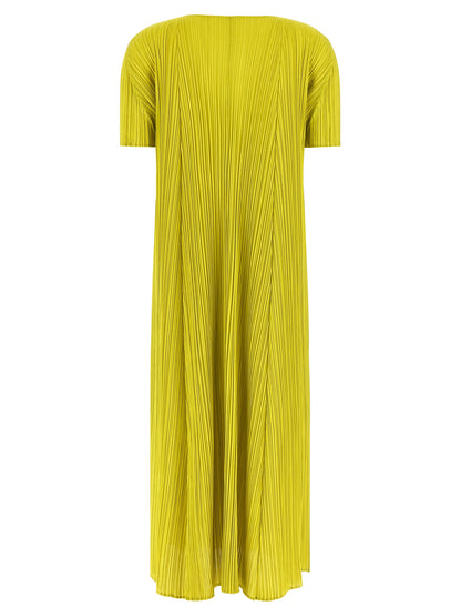 Dress by PLEATS PLEASE ISSEY MIYAKE for women in polyester bicolour & green features a dramatic silhouette, showcasing an elegant round neckline and that flows into a dramatic midi short.