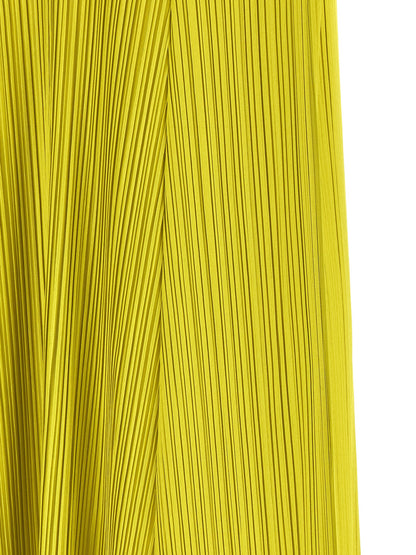 Dress by PLEATS PLEASE ISSEY MIYAKE for women in polyester bicolour & green features an cute silhouette, detailed with a and that elegantly flows into a cute midi short.