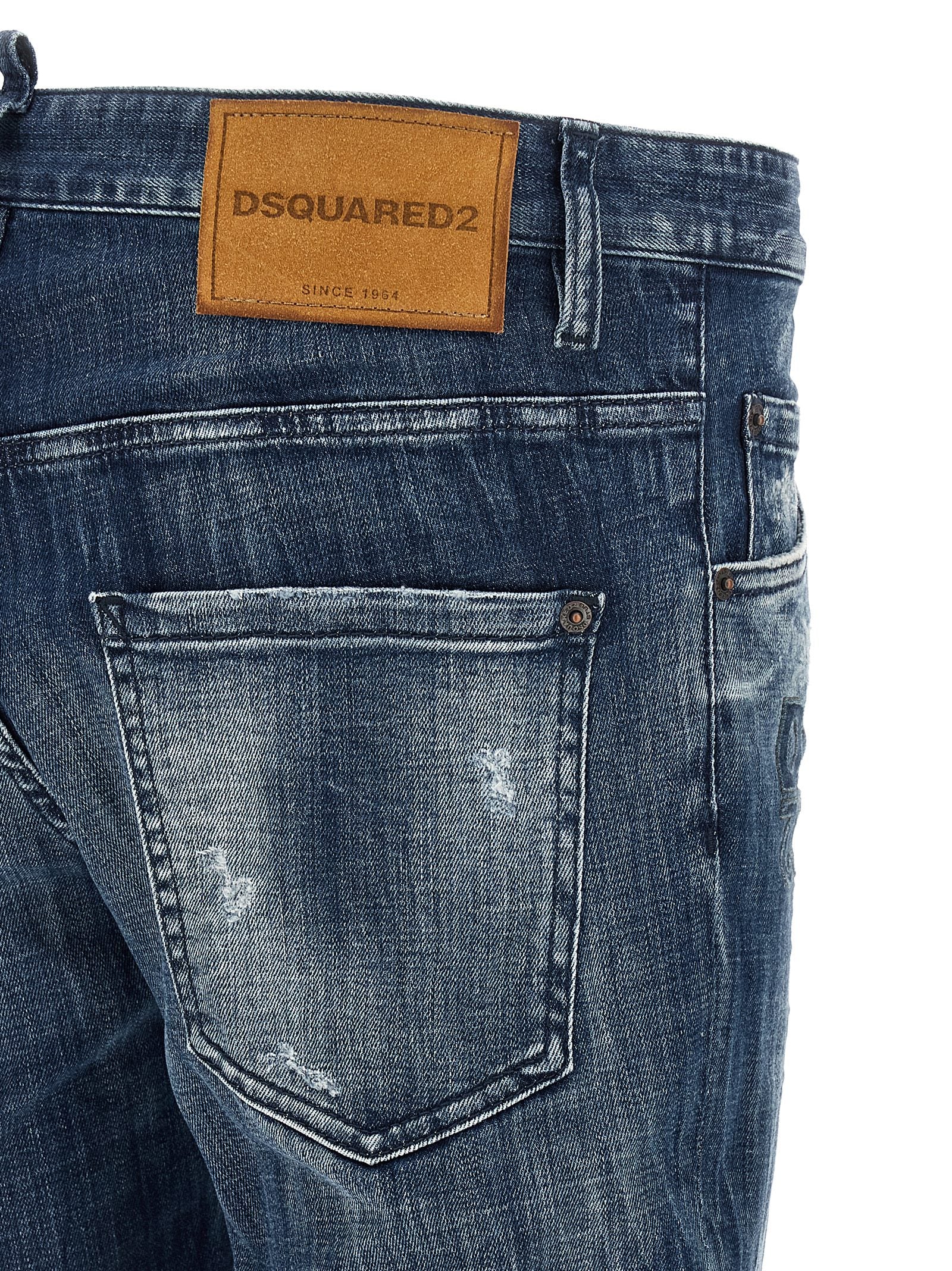 Jeans by Dsquared² for men in stretch denim cotton blue & signature features a refined silhouette with a refined relaxed-fit, defined by a low rise and a refined long for a refined finish.