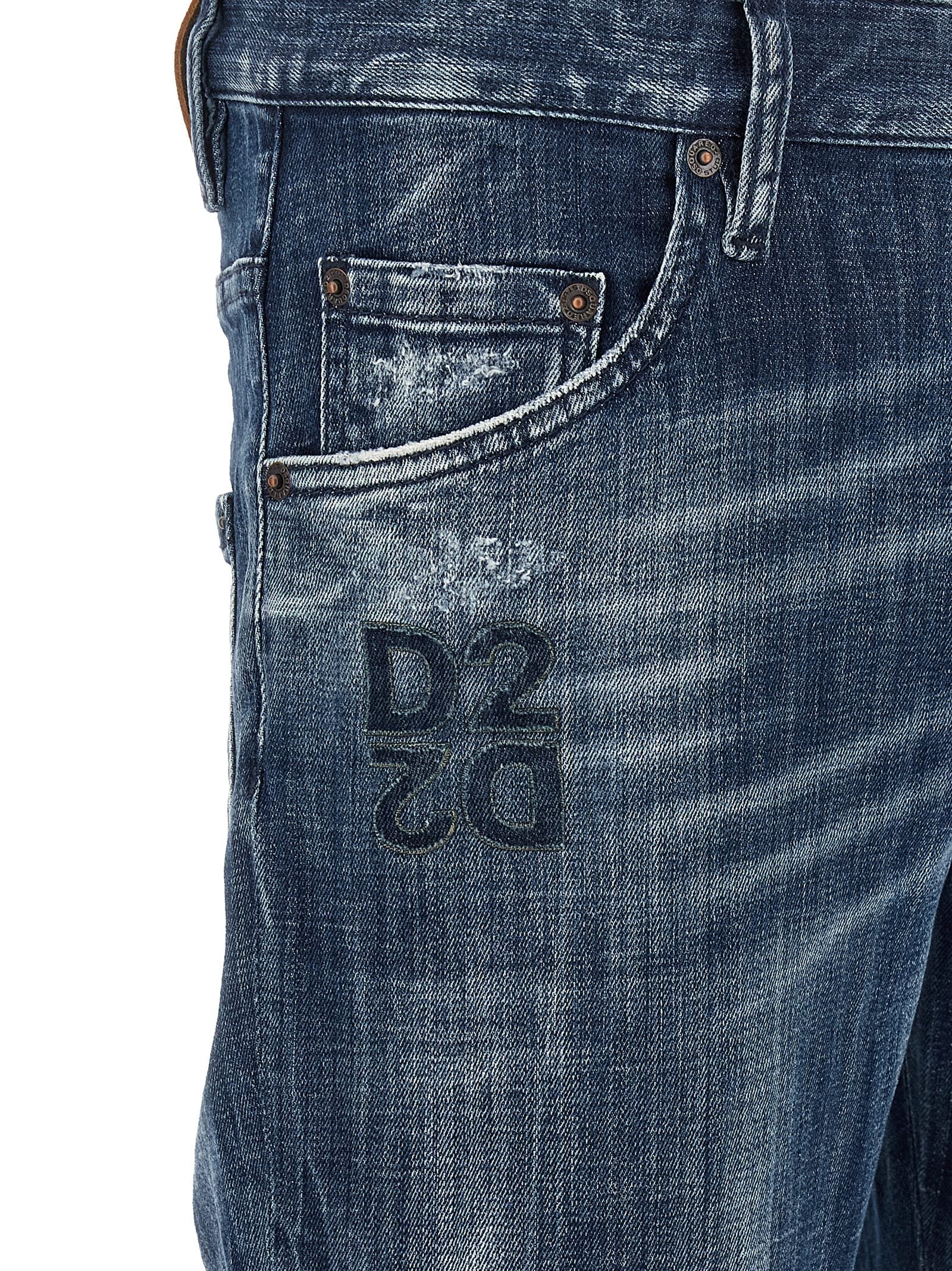 Jeans by Dsquared² for men in stretch denim cotton blue & signature features an sophisticated low rise and relaxed-fit with a precise long, creating a sophisticated and sophisticated silhouette.