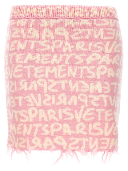 Skirt by Vetements for women in merino wool multicolor, pink, patterned, jacquard & monogram features a captivating silhouette, showcasing the captivating Women's Merino Wool Maxi Long Skirt design with a sophisticated maxi long for a captivating look.